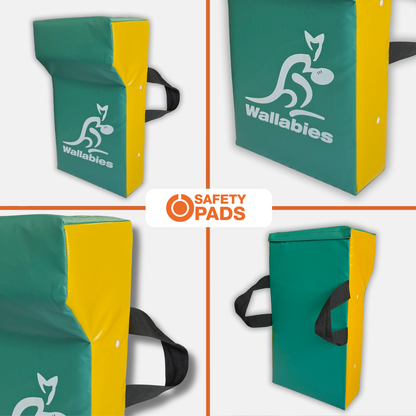 A collage showing four views of a green and yellow wallaby safety pad with a black carrying strap. The pad features a white kangaroo logo and the text 'Wallabies'.